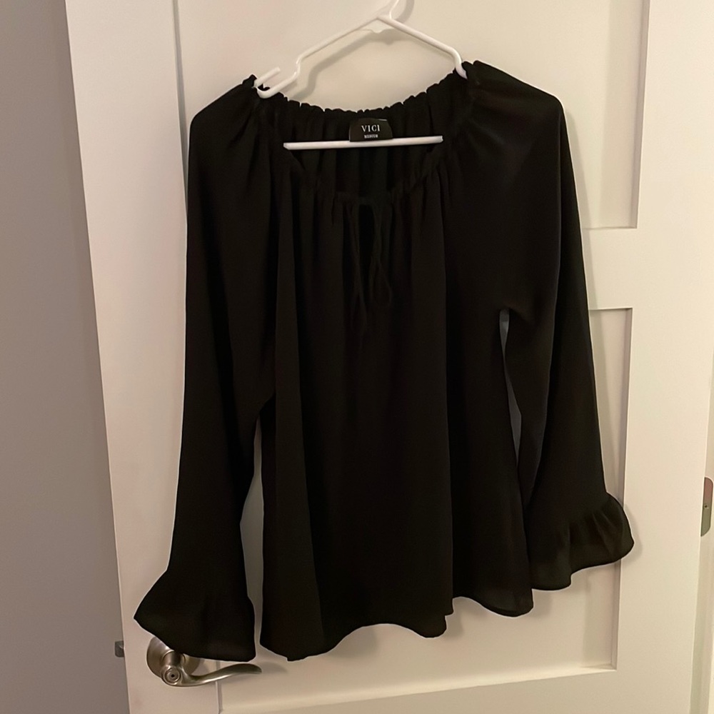 Black long sleeve with bell sleeves and tie